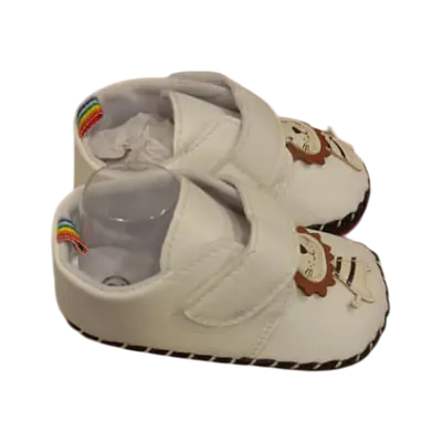 White Baby Shoes With a Cartoon Lion Appliqué secondary image
